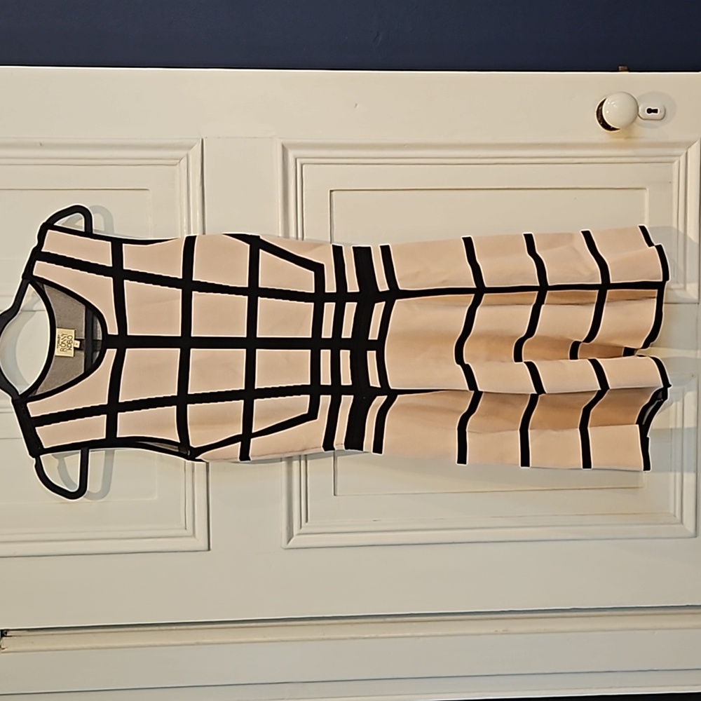 Beige and black dress torn by Ronny kobo